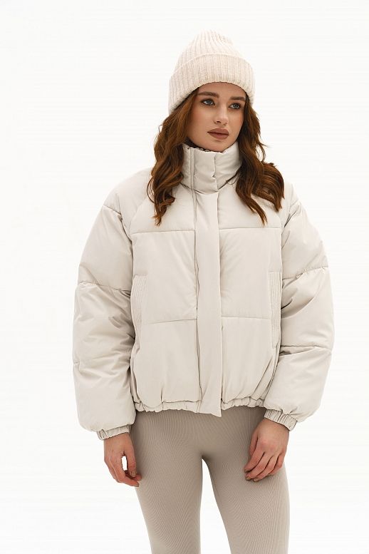 Пуховик вкорочений на замку молочний