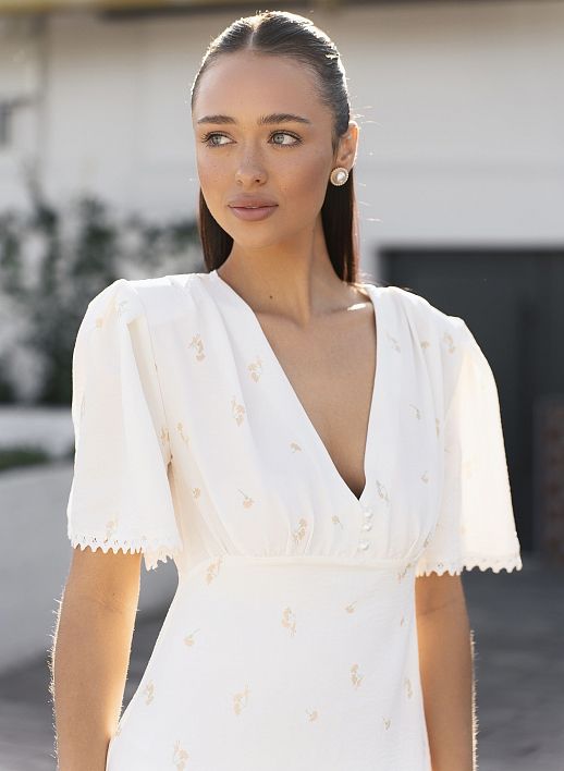 Сукня міні з гудзиками та мереживом молочна в помаранчеві гвоздики